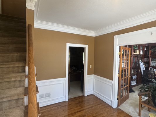Interior Repaint - This customer called us in to help her revitalize the foyer in her home. The outdated green made the room feel dark and small, so we worked with her to change things around and get her a fresh new coat. We got the job done just in time for her family to visit on Easter Sunday! Interior Repaint - This customer called us in to help her revitalize the foyer in her home. The outdated green made the room feel dark and small, so we worked with her to change things around and get her a fresh new coat. We got the job done just in time for her family to visit on Easter Sunday!