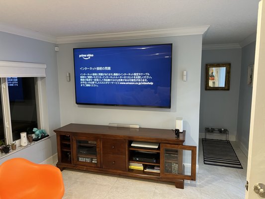 A Big TV loose in Miami - Our customer bought an 82-inch TV and a 5.1 surround sound system to upgrade their existing home theater system. We assisted them in remounting the TV and setting up their new sound system, in addition to streamlining the system's wires and simplifying their setup. A Big TV loose in Miami - Our customer bought an 82-inch TV and a 5.1 surround sound system to upgrade their existing home theater system. We assisted them in remounting the TV and setting up their new sound system, in addition to streamlining the system's wires and simplifying their setup.