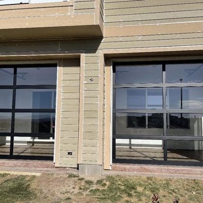 Custom Glass Doors - Glass or "clear view" style garage doors significantly increase the form and function of any garage. The possibilities are endless with this modern garage door style, so fill out our online form today to get your FREE quote over the phone. Custom Glass Doors - Glass or "clear view" style garage doors significantly increase the form and function of any garage. The possibilities are endless with this modern garage door style, so fill out our online form today to get your FREE quote over the phone.