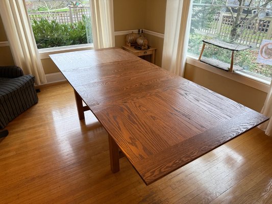 Custom solid oak kitchen table - This custom built table was made of solid oak. It included 2 removable leaf sections that allowed the table to expand and retract based on the customers need. Custom solid oak kitchen table - This custom built table was made of solid oak. It included 2 removable leaf sections that allowed the table to expand and retract based on the customers need.