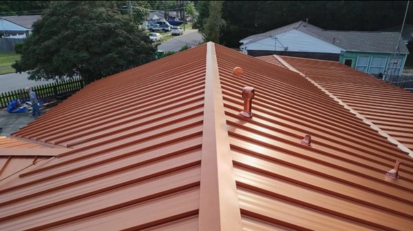 Metal roofing. - A beautiful colored Standing Seam Metal Roof System. Metal roofing. - A beautiful colored Standing Seam Metal Roof System.