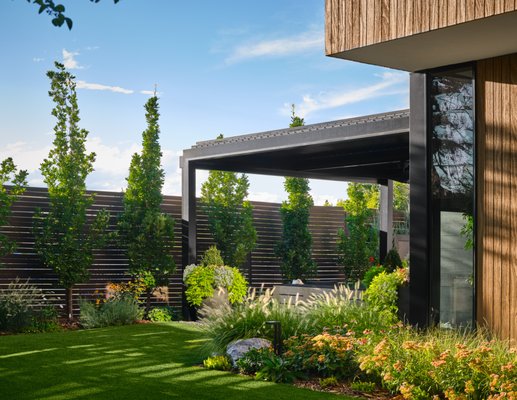 Architectural Harmony - This projected presented a unique challenge: transform a stark and underwhelming landscape into a dynamic, multi-functional outdoor environment that complements the home’s modern architecture. The result is a cohesive series of outdoor “rooms” designed for year-round enjoyment—blending clean architectural lines with lush planting, calming water features, and practical amenities for comfort and sustainability. Architectural Harmony - This projected presented a unique challenge: transform a stark and underwhelming landscape into a dynamic, multi-functional outdoor environment that complements the home’s modern architecture. The result is a cohesive series of outdoor “rooms” designed for year-round enjoyment—blending clean architectural lines with lush planting, calming water features, and practical amenities for comfort and sustainability.