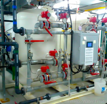 Community Iron Filtration - Skid-mounted, PLC controlled manganese greensand filters, c/w chemical feed systems