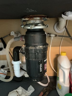Garbage Disposal Replacement in San Antonio - This project involved a complete garbage disposal replacement in a residential kitchen located in San Antonio. The homeowner had been experiencing persistent issues with their existing unit, which had stopped functioning properly due to age, rust buildup, and frequent clogs. Water was backing up into the sink, creating unpleasant odors and making daily kitchen use inconvenient. Upon inspection, our technician confirmed that the disposal’s motor had completely failed, and several internal components were beyond repair. The surrounding plumbing connections also showed signs of wear, including minor leaks at the mounting ring and discharge tube, which could lead to further water damage if left unaddressed.

To begin the project, our team carefully disconnected the existing disposal unit while ensuring that all plumbing and electrical lines were safely managed. The old unit was removed and properly disposed of according to local regulations. Next, we inspected the sink flange and drain assembly to ensure that the surrounding connections were still in good condition. We cleaned the area thoroughly and made minor adjustments to the mounting assembly to ensure a secure and level fit for the new unit.

Once the area was prepared, a new, high-efficiency garbage disposal was installed. This modern replacement was chosen for its quiet operation, stainless steel grinding components, and improved energy efficiency. It was securely attached to the existing plumbing system with new seals and fittings to prevent future leaks. The technician also tested the electrical connection to verify safe and proper grounding. After installation, the system was run through several test cycles to ensure optimal performance, confirming that water drained quickly and efficiently without any noise, vibration, or backflow.

The homeowner was also provided with maintenance tips to prolong the lifespan of the new disposal. These included running cold water during operation, avoiding hard or fibrous food waste, and cleaning the unit regularly using mild solutions to prevent buildup. The technician double-checked all fittings and pipes beneath the sink to ensure there were no leaks or moisture accumulation that could cause future issues.

The final inspection confirmed a clean and fully functional installation. The sink area was tidied, and all old components were removed from the property. The transformation was immediate and highly satisfactory. The homeowner reported a noticeable improvement in both functionality and noise reduction. The new garbage disposal restored full use of the kitchen sink, making cleanup faster and more efficient while improving hygiene by preventing standing water and odor buildup.

Overall, the project successfully replaced a malfunctioning and outdated disposal system with a modern, reliable, and energy-efficient unit. The installation not only improved the plumbing performance but also enhanced the overall convenience and comfort of the kitchen. The homeowner was extremely pleased with the outcome, noting the professionalism and attention to detail provided throughout the process. This project demonstrates our commitment to delivering quality plumbing solutions that combine technical expertise, durable materials, and long-term reliability.