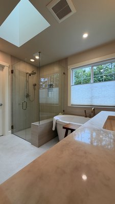 Premium Master Bathroom Remodel & Custom Shower - Take a look at this complete luxury master bathroom transformation by STARCO LLC! We completely redesigned this space on the Eastside from the studs up. 

What we did for this project:
- Full layout demolition and bathroom redesign
- High-end custom wood double vanity with premium quartz countertops
- Modern designer gold fixtures and matching wall sconces
- Luxury freestanding soaking tub positioned perfectly by the window
- Custom walk-in tile shower with a frameless glass enclosure

At STARCO LLC, we specialize in elite Kitchen & Bath remodeling and General Contracting. Fully licensed, bonded, and insured, we serve the entire Eastside area. You deal directly with the owner from start to finish for top-tier craftsmanship and honest pricing. 
Ready to upgrade your home? Click "Request a Quote" today to schedule your free on-site consultation!