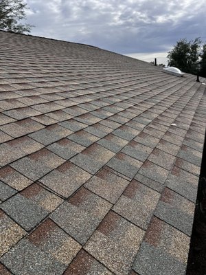Re Roof in Tucson - The old roof was worn and leaking. Our team at The Arizona Roofer, removed that old roof and replaced with a new 30-year GAF desert copper roof. The owner was happy with our team and the results.