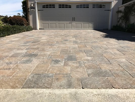 Dana Point Orco Pietra Paver Remodel - This complete hardscape remodel is a huge upgrade from the existing old and tired concrete. We transformed the driveway, walkways, and back patio with Orco Pietra Express Set in Borrego. The driveway was installed at a 90 degree pattern while the walkways and patios where installed at a 45 degree angle. Dana Point Orco Pietra Paver Remodel - This complete hardscape remodel is a huge upgrade from the existing old and tired concrete. We transformed the driveway, walkways, and back patio with Orco Pietra Express Set in Borrego. The driveway was installed at a 90 degree pattern while the walkways and patios where installed at a 45 degree angle.