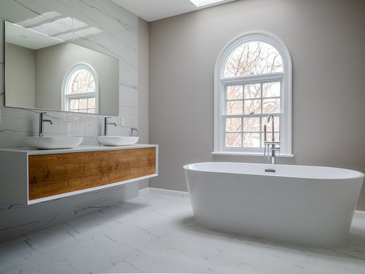 Bathroom remodel - Absolutely all the work was done: dismantling everything old, including walls, floor and ceiling; 
installation of new water and sewerage pipes; 
installation of large tiles; 
installation of a shower area, a new toilet, a new bathtub; 
new electrical wiring and lighting installation