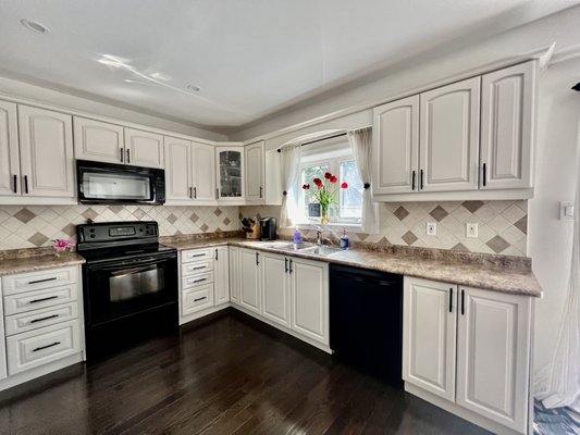 Affordable Elegance: A Kitchen Transformation Story - At Elevated Paint and Decor, we take pride in turning homeowners' dreams into reality, and this captivating kitchen renovation is no exception. Our client loved their kitchen layout but wanted to save costs on renovations to splurge on new appliances and countertops. Painting emerged as the perfect, more affordable option, and we were ready to make their vision come to life.
To begin, we carefully removed all kitchen cabinet doors and drawers, taking them to our custom spray booth where we skillfully applied Benjamin Moore Advance in the exquisite color Baby Fawn OC-15, boasting a warm neutral tone with subtle pink undertones. This selection was thoughtfully made to harmoniously tie in the backsplash and complement the rich espresso flooring.
With meticulous attention to detail, all sanding, both on and off-site, was executed using our advanced HEPA Filter Festool, ensuring a pristine and health-conscious environment.
The result was nothing short of breathtaking. In just four days, we completely transformed the kitchen's ambiance, infusing it with a sense of elegance and warmth. Our client was overjoyed with the outcome, and they didn't have to remove a single item from their cabinets throughout the process.
At Elevated Paint and Decor, we pride ourselves on delivering exceptional results that fit within your budget and preferences. Let us create a captivating transformation for your space, just as we did for this happy homeowner. Reach out to us today, and let's embark on your painting journey together. Affordable Elegance: A Kitchen Transformation Story - At Elevated Paint and Decor, we take pride in turning homeowners' dreams into reality, and this captivating kitchen renovation is no exception. Our client loved their kitchen layout but wanted to save costs on renovations to splurge on new appliances and countertops. Painting emerged as the perfect, more affordable option, and we were ready to make their vision come to life.
To begin, we carefully removed all kitchen cabinet doors and drawers, taking them to our custom spray booth where we skillfully applied Benjamin Moore Advance in the exquisite color Baby Fawn OC-15, boasting a warm neutral tone with subtle pink undertones. This selection was thoughtfully made to harmoniously tie in the backsplash and complement the rich espresso flooring.
With meticulous attention to detail, all sanding, both on and off-site, was executed using our advanced HEPA Filter Festool, ensuring a pristine and health-conscious environment.
The result was nothing short of breathtaking. In just four days, we completely transformed the kitchen's ambiance, infusing it with a sense of elegance and warmth. Our client was overjoyed with the outcome, and they didn't have to remove a single item from their cabinets throughout the process.
At Elevated Paint and Decor, we pride ourselves on delivering exceptional results that fit within your budget and preferences. Let us create a captivating transformation for your space, just as we did for this happy homeowner. Reach out to us today, and let's embark on your painting journey together.