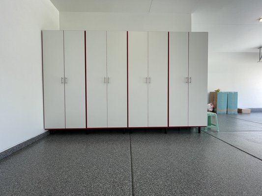 White and red garage cabinets - Built very sturdy and stylish cabinets for clients garage. We used 3/4” white melamine with red edgebanding on panels and doors and brushed nickel bar pulls White and red garage cabinets - Built very sturdy and stylish cabinets for clients garage. We used 3/4” white melamine with red edgebanding on panels and doors and brushed nickel bar pulls
