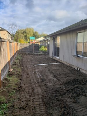 Outdoor living in Woodland, WA 2019 - This project transformed a small yard into an amazing outdoor entertaining area. This featured premium pavers, a 12' island kitchen complete with a refrigerator, 40" 5 burner premium grill, access cabinets, and sink with hot and cold water. We added a custom built fire pit and bench for those nights when the guests and children want to hang outside a little later. Outdoor living in Woodland, WA 2019 - This project transformed a small yard into an amazing outdoor entertaining area. This featured premium pavers, a 12' island kitchen complete with a refrigerator, 40" 5 burner premium grill, access cabinets, and sink with hot and cold water. We added a custom built fire pit and bench for those nights when the guests and children want to hang outside a little later.