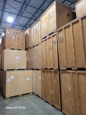 MOVING STORAGE STORAGE & WAREHOUSING - Storage Services
Bernard Movers offers a comprehensive range of storage solutions tailored to meet the needs of both residential and commercial customers. Whether you're caught between real estate closing dates or wondering where to store your patio set during the winter months, we have you covered. Our state-of-the-art warehouse is climate-controlled, dry, and fully insured, ensuring that your belongings are safe and well-protected. We can accommodate the storage needs of 50 to 1000 customers at any given time, so there’s ample space for everything from a few items to an entire household.

SIT: Storage in Transit
Sometimes you only need storage for a short period, like a few hours or overnight. In the moving industry, we call this Storage in Transit (SIT). This service is offered at a reduced rate compared to traditional storage options and is designed to meet the specific needs of our customers. For example, if you are moving out of an apartment on the 31st and can't get into your new home until the morning of the 1st, we can store your belongings securely in our locked and temperature-controlled moving trucks overnight and unload them the following morning. Our facilities and trucks are monitored 24/7 to ensure the safety and security of your property.

Crating and Vaulting
Our crating and vaulting services are conducted at our Melrose Park, IL warehouse. For customers requiring long-distance moves or longer-term storage, we transport your items in a 26ft moving truck to our facility, where they are professionally packed into a 7’ x 5’ x 7.5’ moving vault. These vaults are then shipped via freight to your new location, offering a cost-effective alternative to traditional van line services.

Contact Bernard Movers Today
For more details on our storage services or to schedule an appointment, please contact us at (773) 883-0780. Bernard Movers is based in Chicago and serves many surrounding suburbs and neighborhoods.

Bernard Movers: Making your storage needs effortless.