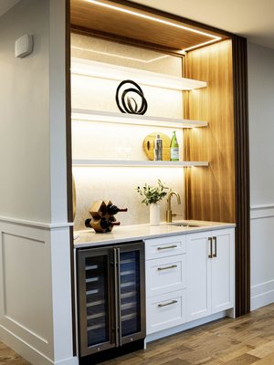 BAR CABINETS - Custom bars designed to elevate entertaining with elegance, functionality, and precision. Each project blends high-quality materials, refined finishes, and custom cabinetry to create a space that is both inviting and highly practical. Thoughtful layouts, integrated storage, and detailed craftsmanship come together to deliver a bar that feels seamless, durable, and tailored to the lifestyle of each client.