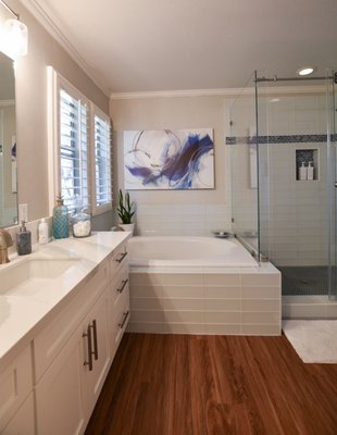 El Dorado Hills - Modern Bathroom Remodel - We recently completed a modern bathroom remodel featuring rectangular white tiles with a bluish tint, elegantly used throughout both the bath and shower areas. Additionally, we installed new cabinetry with custom countertops, creating a sleek and cohesive look. Contact us for your next remodeling project and let us transform your bathroom into a modern oasis. El Dorado Hills - Modern Bathroom Remodel - We recently completed a modern bathroom remodel featuring rectangular white tiles with a bluish tint, elegantly used throughout both the bath and shower areas. Additionally, we installed new cabinetry with custom countertops, creating a sleek and cohesive look. Contact us for your next remodeling project and let us transform your bathroom into a modern oasis.