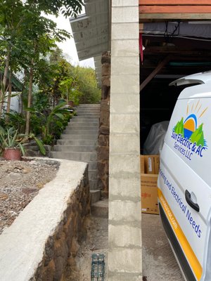 2020 St. Louis Heights AC installation - This challenging install was done on a steep slope in a home at St. Louis Heights, Honolulu. One of the outdoor condensing units needed to be wall mounted above ground with a stainless steel bracket. It worked out perfectly and the owners were stoked. Please see their yelp review under reviews.