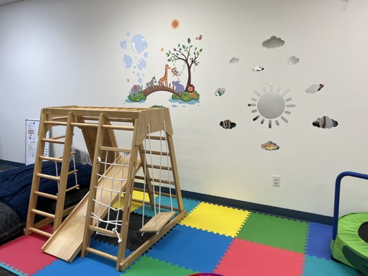 Redecorated gym area - We added decorations to our gym area to assist the children in having fun while they are working on their speech and language goals.