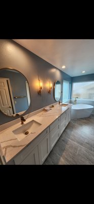Primary Bathroom Remodel - For this primary bathroom, we replaced the drop in tub with a free standing, updated the cabinets and countertops, and remodeled the walkin shower. Primary Bathroom Remodel - For this primary bathroom, we replaced the drop in tub with a free standing, updated the cabinets and countertops, and remodeled the walkin shower.