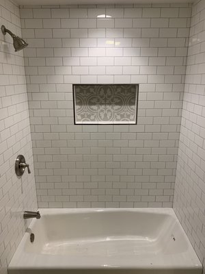 Master Bathroom Tub/Shower Remdoel. - This Shower used to be an old plastic/ fiberglass enclosure. Our client decided to upgrade that to a new full tile shower and new tub. Great new look!