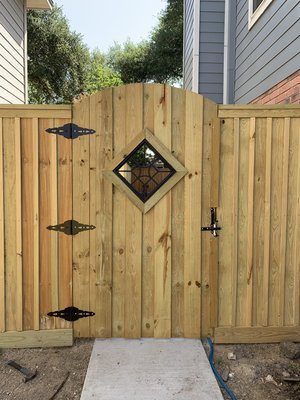 Full Privacy Custom Gate - Custom Gate design proved by customer. He requested a full privacy fence with no gap showing. The project was done in several day due to the scope of project but easily could’ve been done much sooner. We try to adjust our time frame to your need and make the best of the custom designs you prove to us.