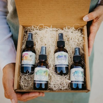 Room and Body Sprays - Our handcrafted Room and Body Sprays are composed of our signature blends of pure and natural essential oils, vegetable glycerin and distilled water. Composed of fully natural, non-toxic, and eco-friendly ingredients, each room and body spray also promotes emotional well-being and aromatherapy benefits.
Beyond the beautiful scent profile, you can be fully confident in the safety and non-toxicity of your Root and Splendor products. As a consumer we want you to also consider packaging and its impact on your health and the environment.
Our room and body sprays are stored in glass which, unlike plastic, will prevent the essential oils from oxidizing, deteriorating, or compromising their beneficial aromatherapy properties and scents over time. Glass, though costlier, is the material we believe is safest for our formulas and customers. The essential oils can eat plastic over time, damaging the oils and the chemistry makeup of your spray. Once that's altered we would never want you spraying that on your body or inhaling the aromas as it could pose a risk to your health. Furthermore, glass, though heavier, is the most easily recycled material making it a preferred choice for sustainability. Also, glass maintains its structure and integrity over time leaving it as a great option for repurposing and refilling with more room and body spray!
Shake your Room and Body Spray well before each use. Spray often and everywhere - on your bodies, in your rooms, on the animals, kids or cars. Safe for any and all. Room and Body Sprays - Our handcrafted Room and Body Sprays are composed of our signature blends of pure and natural essential oils, vegetable glycerin and distilled water. Composed of fully natural, non-toxic, and eco-friendly ingredients, each room and body spray also promotes emotional well-being and aromatherapy benefits.
Beyond the beautiful scent profile, you can be fully confident in the safety and non-toxicity of your Root and Splendor products. As a consumer we want you to also consider packaging and its impact on your health and the environment.
Our room and body sprays are stored in glass which, unlike plastic, will prevent the essential oils from oxidizing, deteriorating, or compromising their beneficial aromatherapy properties and scents over time. Glass, though costlier, is the material we believe is safest for our formulas and customers. The essential oils can eat plastic over time, damaging the oils and the chemistry makeup of your spray. Once that's altered we would never want you spraying that on your body or inhaling the aromas as it could pose a risk to your health. Furthermore, glass, though heavier, is the most easily recycled material making it a preferred choice for sustainability. Also, glass maintains its structure and integrity over time leaving it as a great option for repurposing and refilling with more room and body spray!
Shake your Room and Body Spray well before each use. Spray often and everywhere - on your bodies, in your rooms, on the animals, kids or cars. Safe for any and all.