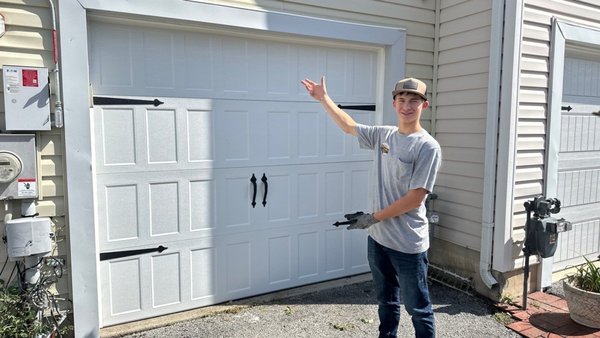 Garage Bedroom Door Replacement - This homeowner had built a finished bedroom in their garage space and walled in over the existing garage door. This was great until the door was hit from the outside and it needed to be replaced. We were thinking that we would need to remove the wall into the bedroom to access the garage door hardware and remove the door. Our techs were able to only cut two smaller holes in the wall and get the job done. Garage Bedroom Door Replacement - This homeowner had built a finished bedroom in their garage space and walled in over the existing garage door. This was great until the door was hit from the outside and it needed to be replaced. We were thinking that we would need to remove the wall into the bedroom to access the garage door hardware and remove the door. Our techs were able to only cut two smaller holes in the wall and get the job done.