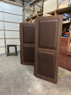 Upholstered Partition - legant, free-standing upholstered dividers designed for a winery, seamlessly defining the space between two rooms. The dividers feature high-quality upholstery that adds a touch of sophistication while providing functionality, enhancing the atmosphere and maintaining an open, inviting feel. Their sturdy construction ensures stability, making them both a stylish and practical choice for creating intimate, distinct areas within the winery. Perfect for adding privacy and enhancing acoustics without the need for permanent walls. Upholstered Partition - legant, free-standing upholstered dividers designed for a winery, seamlessly defining the space between two rooms. The dividers feature high-quality upholstery that adds a touch of sophistication while providing functionality, enhancing the atmosphere and maintaining an open, inviting feel. Their sturdy construction ensures stability, making them both a stylish and practical choice for creating intimate, distinct areas within the winery. Perfect for adding privacy and enhancing acoustics without the need for permanent walls.
