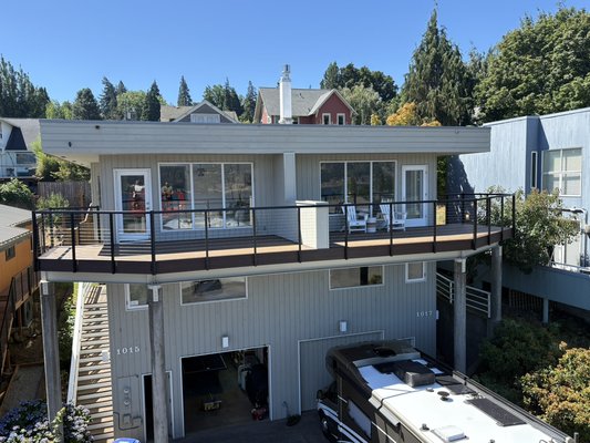 Custom deck design - This custom deck build was done with steel structural beams with composite decking and a custom railing Custom deck design - This custom deck build was done with steel structural beams with composite decking and a custom railing