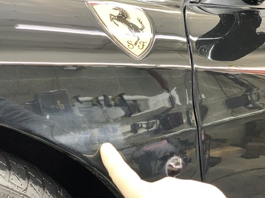 Ferrari paint correction, fixing dealership's mistake.  Protecting with ceramic coating. - This 2006 black Ferrari had paint damage from an inexperienced detailer at a local dealership.  I show the process of correcting this damage.  Then I coat it with ceramic coating to protect the shine.