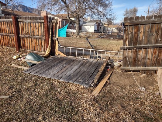 Wooden Fence Repair - Typical Colorado wind-damaged fence. Posts replaced and fence integrity completely restored. Wooden Fence Repair - Typical Colorado wind-damaged fence. Posts replaced and fence integrity completely restored.