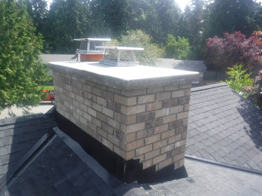 Free Estimate for Chimney roofline up rebuild. - This customer chose canyon mist bricks for their roofline up rebuild. We installed new chimney counter flashing, chimney flue tiles, pour in place concrete crown, stainless steel chimney caps and water repellent. Call us today for a free estimate. Free Estimate for Chimney roofline up rebuild. - This customer chose canyon mist bricks for their roofline up rebuild. We installed new chimney counter flashing, chimney flue tiles, pour in place concrete crown, stainless steel chimney caps and water repellent. Call us today for a free estimate.