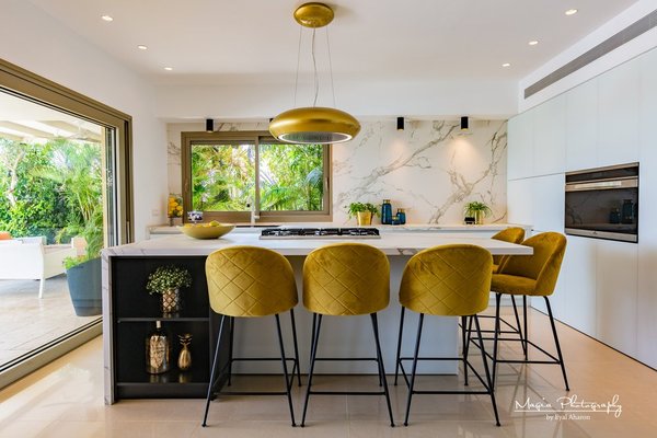 A Culinary Space Reimagined by HQ Remodeling & Design in Brea, CA - Introducing the epitome of culinary chic: a stunning kitchen remodel by HQ Remodeling & Design in the heart of Brea, CA. This project is a showcase of the finesse and expertise that our general contractors and remodeling contractors bring to every construction and home remodeling endeavor.
The attached images display an airy and bright kitchen space, accentuated by a majestic marble island that invites both culinary creativity and social gatherings. The island's sleek design and integrated gas cooktop illustrate the innovative solutions our kitchen remodel team excels in.
Above, a statement gold pendant light casts a warm glow over the mustard velvet bar stools, adding a dash of opulence to the minimalist decor. The kitchen’s clean lines are complemented by state-of-the-art appliances seamlessly integrated into the cabinetry, reflecting the high standards of construction companies today.
The attention to detail is palpable in the choice of high-quality materials and fixtures. From the luxury marble backsplash to the tailored cabinetry, every aspect has been meticulously selected and crafted by our team, ensuring that the final product is not only visually stunning but also supremely functional.
The open-plan design merges indoor sophistication with the allure of the outdoor patio, captured through the expansive windows, filling the kitchen with natural light and offering serene views that promise to elevate any dining experience.
At HQ Remodeling & Design, our contractors are dedicated to transforming homes into spaces that resonate with the lifestyle and aspirations of our clients. This kitchen remodel in Aliso Viejo is a testament to our commitment as a general contractor to deliver unparalleled quality and style.
Transform your Aliso Viejo home with the signature touch of HQ Remodeling & Design. Whether it’s a bathroom remodel or a full kitchen overhaul, our expert contractors are at the ready to bring your vision to fruition. Visit our Yelp listing or contact us directly to start your home’s transformation today! A Culinary Space Reimagined by HQ Remodeling & Design in Brea, CA - Introducing the epitome of culinary chic: a stunning kitchen remodel by HQ Remodeling & Design in the heart of Brea, CA. This project is a showcase of the finesse and expertise that our general contractors and remodeling contractors bring to every construction and home remodeling endeavor.
The attached images display an airy and bright kitchen space, accentuated by a majestic marble island that invites both culinary creativity and social gatherings. The island's sleek design and integrated gas cooktop illustrate the innovative solutions our kitchen remodel team excels in.
Above, a statement gold pendant light casts a warm glow over the mustard velvet bar stools, adding a dash of opulence to the minimalist decor. The kitchen’s clean lines are complemented by state-of-the-art appliances seamlessly integrated into the cabinetry, reflecting the high standards of construction companies today.
The attention to detail is palpable in the choice of high-quality materials and fixtures. From the luxury marble backsplash to the tailored cabinetry, every aspect has been meticulously selected and crafted by our team, ensuring that the final product is not only visually stunning but also supremely functional.
The open-plan design merges indoor sophistication with the allure of the outdoor patio, captured through the expansive windows, filling the kitchen with natural light and offering serene views that promise to elevate any dining experience.
At HQ Remodeling & Design, our contractors are dedicated to transforming homes into spaces that resonate with the lifestyle and aspirations of our clients. This kitchen remodel in Aliso Viejo is a testament to our commitment as a general contractor to deliver unparalleled quality and style.
Transform your Aliso Viejo home with the signature touch of HQ Remodeling & Design. Whether it’s a bathroom remodel or a full kitchen overhaul, our expert contractors are at the ready to bring your vision to fruition. Visit our Yelp listing or contact us directly to start your home’s transformation today!
