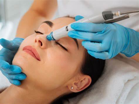 Hydrafacial - Unlike chemical peels or laser treatments that come with a little bit of pain and discomfort, one of the unique benefits of HydraFacial’s is that they are pain free and actually quite relaxing. So, during your HydraFacial appointment, you can literally sit back and relax. The HydraFacial treatment goes as follows:
Step 1.Cleansing and Exfoliation. Dead skin cells are removed to reveal healthy new skin.
Step 2. The skin is infused with a glycolic solution to help purify the skin
Step 3. Blackheads will be removed and pores will be cleaned with an automated extraction device that uses vortex suction.
Step 4. Antioxidants and Hyaluronic Acid are infused to nourish and protect the skin. Hydrafacial - Unlike chemical peels or laser treatments that come with a little bit of pain and discomfort, one of the unique benefits of HydraFacial’s is that they are pain free and actually quite relaxing. So, during your HydraFacial appointment, you can literally sit back and relax. The HydraFacial treatment goes as follows:
Step 1.Cleansing and Exfoliation. Dead skin cells are removed to reveal healthy new skin.
Step 2. The skin is infused with a glycolic solution to help purify the skin
Step 3. Blackheads will be removed and pores will be cleaned with an automated extraction device that uses vortex suction.
Step 4. Antioxidants and Hyaluronic Acid are infused to nourish and protect the skin.