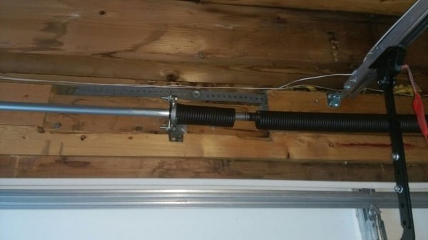 A Team Garage Doors 720-556-8016 - We replace residential and commercial torsion springs.
