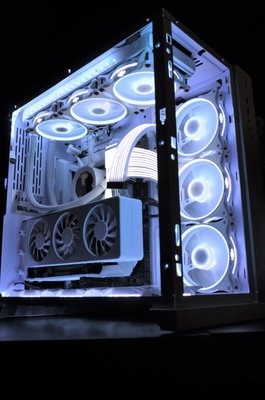 Project Snow - This Custom computer was done for a client who requested all white! We did that exactly and hand wrapped the aio, custom painted the rubber garments, radiator, as well as the GPU fans and case fans. After that, we proceeded to make white aio sleeves, wrap the motherboard, and paint the vertical GPU mount. We put a lot of pride into our work so we also took the time to paint every screw visible white. This was project, Snow. Our client was very satisfied Project Snow - This Custom computer was done for a client who requested all white! We did that exactly and hand wrapped the aio, custom painted the rubber garments, radiator, as well as the GPU fans and case fans. After that, we proceeded to make white aio sleeves, wrap the motherboard, and paint the vertical GPU mount. We put a lot of pride into our work so we also took the time to paint every screw visible white. This was project, Snow. Our client was very satisfied