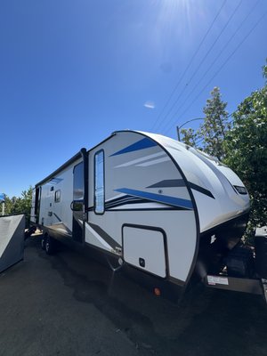 30ft Camping Trailer Wash & Ceramic Coat - Performed a complete exterior wash and applied a professional-grade ceramic coating on a 30-foot trailer, providing up to 2 years of protection. The coating enhances gloss and color depth while creating a durable barrier against dirt, road grime, and UV damage. Special care was taken to cover all surfaces evenly, ensuring long-lasting durability and a showroom-quality finish for this large commercial vehicle