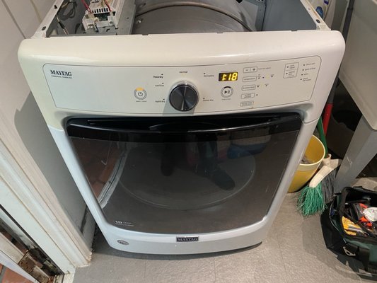 Dryer Machine Repair - Our technician performed diagnostic tests and replaced the faulty thermal fuse, restoring safe and reliable operation of the washer.