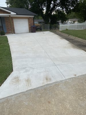 Fresh pour = curb appeal - Customer wanted to put the home on the market, but the old driveway was a problem. On top of that, they wanted a back patio as well. The driveway and the patio was done 4 days later. Now the house stands out in all the right ways! Fresh pour = curb appeal - Customer wanted to put the home on the market, but the old driveway was a problem. On top of that, they wanted a back patio as well. The driveway and the patio was done 4 days later. Now the house stands out in all the right ways!