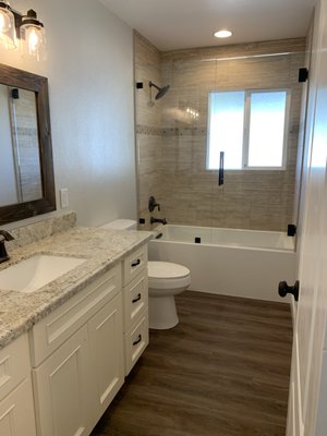 Dennis Bathroom - This bathroom was very dated. We updated it blending modern finishes with traditional style and warm colors. Dennis Bathroom - This bathroom was very dated. We updated it blending modern finishes with traditional style and warm colors.