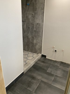 Shower Remodel in Laguna Hills, CA - Really beautiful shower remodel at Laguna Hills, CA. Client wanted his shower to look as natural as possible, so I head out to the store and found this 12x24 tiles that looked like natural stone. The dark gray tiles on the floor really gave the bathroom a nice contrast. Owner was very impressed with the results. Shower Remodel in Laguna Hills, CA - Really beautiful shower remodel at Laguna Hills, CA. Client wanted his shower to look as natural as possible, so I head out to the store and found this 12x24 tiles that looked like natural stone. The dark gray tiles on the floor really gave the bathroom a nice contrast. Owner was very impressed with the results.