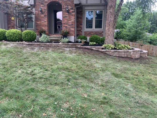 Smith: Retaining Wall for Curb Appeal - This customer had an old crumbling retaining wall that was falling apart. She wanted a more clean, streamlined look for her retaining wall. Smith: Retaining Wall for Curb Appeal - This customer had an old crumbling retaining wall that was falling apart. She wanted a more clean, streamlined look for her retaining wall.