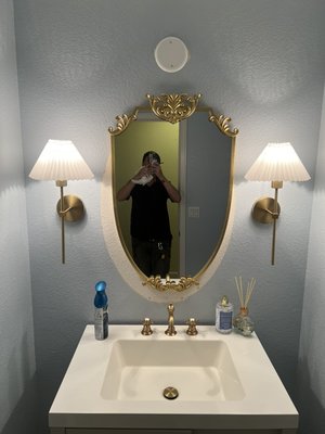 Bathroom faucet replacement and installation of bidet and mirror - This project included replacing the old faucet with a brass finished two handle faucet with pop-up drain. I hung a very classy mirror and installed a bidet that was mounted on the wall Bathroom faucet replacement and installation of bidet and mirror - This project included replacing the old faucet with a brass finished two handle faucet with pop-up drain. I hung a very classy mirror and installed a bidet that was mounted on the wall