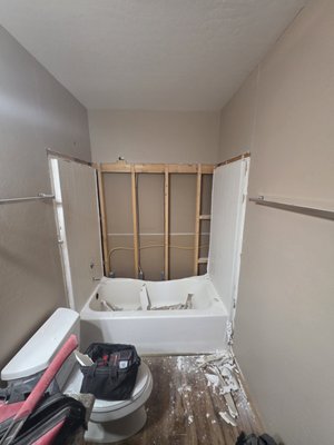 Tub to walk-in shower conversion - This remodel that was completed was an old tub and we transformed it into a beautiful walk-in shower with a floating bench, sliding glass door and 2 handles with 2 corner shelfs. We also switched out their vanity light and the customers are in love with our work and workmanship. Tub to walk-in shower conversion - This remodel that was completed was an old tub and we transformed it into a beautiful walk-in shower with a floating bench, sliding glass door and 2 handles with 2 corner shelfs. We also switched out their vanity light and the customers are in love with our work and workmanship.