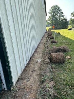 Groundhog Exclusion - This Groundhog exclusion was on a large riding arena. 675' linear feet around. They had a chronic groundhog problem. Instead of continuously trapping the groundhogs, we evicted the ones that were there and installed a buried exclusion barrier to prevent any animals from digging under the foundation. This is one of the largest groundhog exclusions we have done. But its exactly the same concept as we would use on your shed or porch.