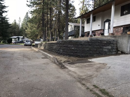 Retaining wall June 2024 - Old retaining wall had fallen apart. We did full demo of existing wall and rebuilt wall with 18” concrete block. Retaining wall June 2024 - Old retaining wall had fallen apart. We did full demo of existing wall and rebuilt wall with 18” concrete block.