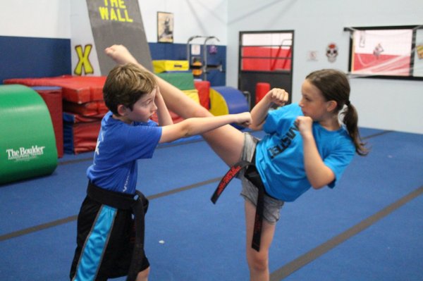 Martial Arts for kids and teens - Team XSAMA Xtreme Starz students (ages 6 and older) enjoy a high energy and fast pace program. Students learn the best there is to offer in modern Martial Arts and Parkour.