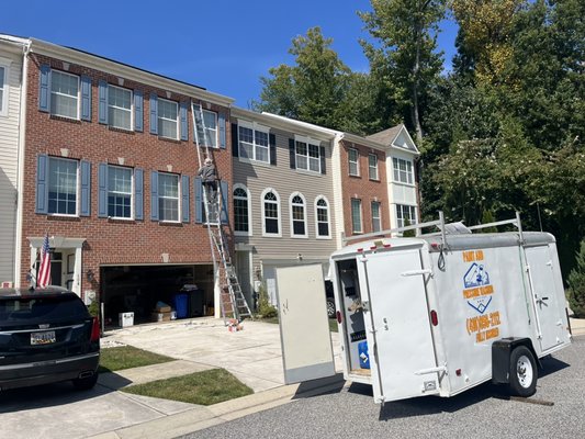 Brick home restoration - We restored the clients shutters along with door and removed the old caulked and resealed the windows.