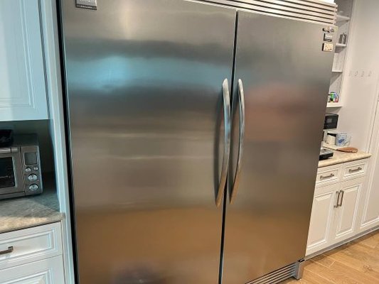 Frigidaire Gallery refrigerator leaking repair - A customer called with a problem with a leak under the refrigerator. Diagnostics revealed a problem in the defrost system. The drain line was also cleaned.