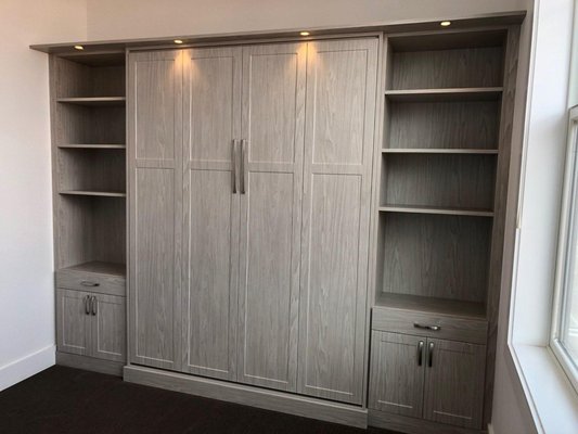Murphy Bed - Think of all the space your bed takes up! With a Murphy bed installation, that space instantly becomes usable for other things as your bed folds conveniently away into the wall. We install beautiful Murphy beds in Fort Collins that look great when hidden and feel great while you’re sleeping on them. Murphy Bed - Think of all the space your bed takes up! With a Murphy bed installation, that space instantly becomes usable for other things as your bed folds conveniently away into the wall. We install beautiful Murphy beds in Fort Collins that look great when hidden and feel great while you’re sleeping on them.