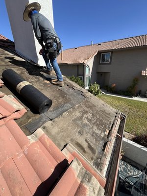 Chimney roof leak - We spotted where the leak was coming from and replaced the felt that was damaged. Chimney roof leak - We spotted where the leak was coming from and replaced the felt that was damaged.