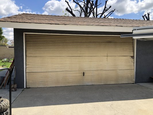 Garage Door Replacement – Anaheim, CA - This garage door replacement was completed for a homeowner in Anaheim, CA. The original garage door was old, dented, and difficult to open, taking away from the home’s curb appeal. Our team at Rollit Garage Doors replaced it with a brand-new, insulated steel garage door featuring a clean, modern panel design. The new installation not only improved the appearance of the home but also provided smoother, quieter operation and increased security. This project was completed in just one day and came with our full parts and labor warranty.